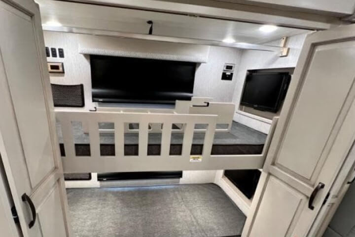 Bunk beds with personal TVs