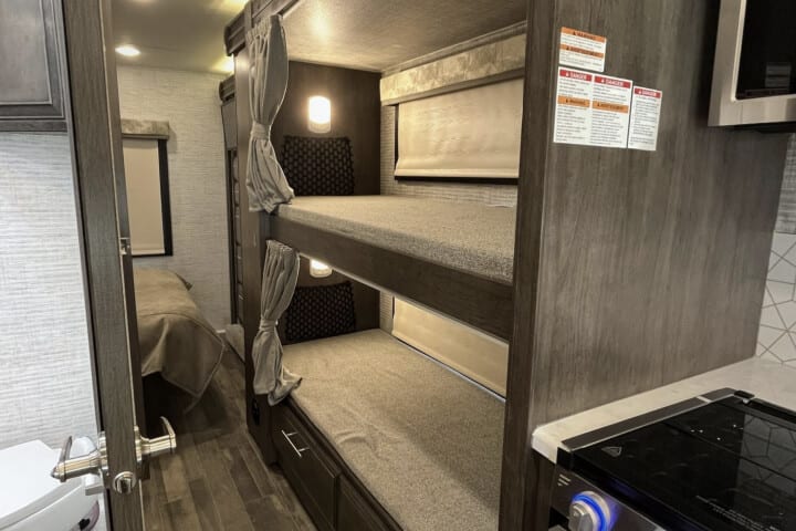 Bunk beds with personal TVs